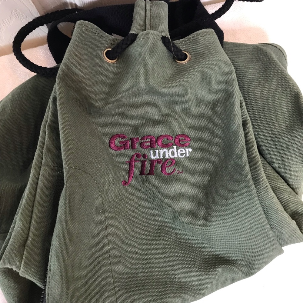 Tv swag grace under fire sling backpack